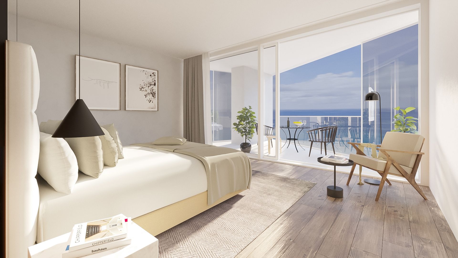 Bedroom opening onto a balcony with a cafe table and the Gulf beyond